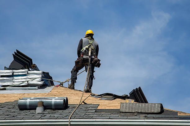 Professional Roofing technician working in Stacyville, IA